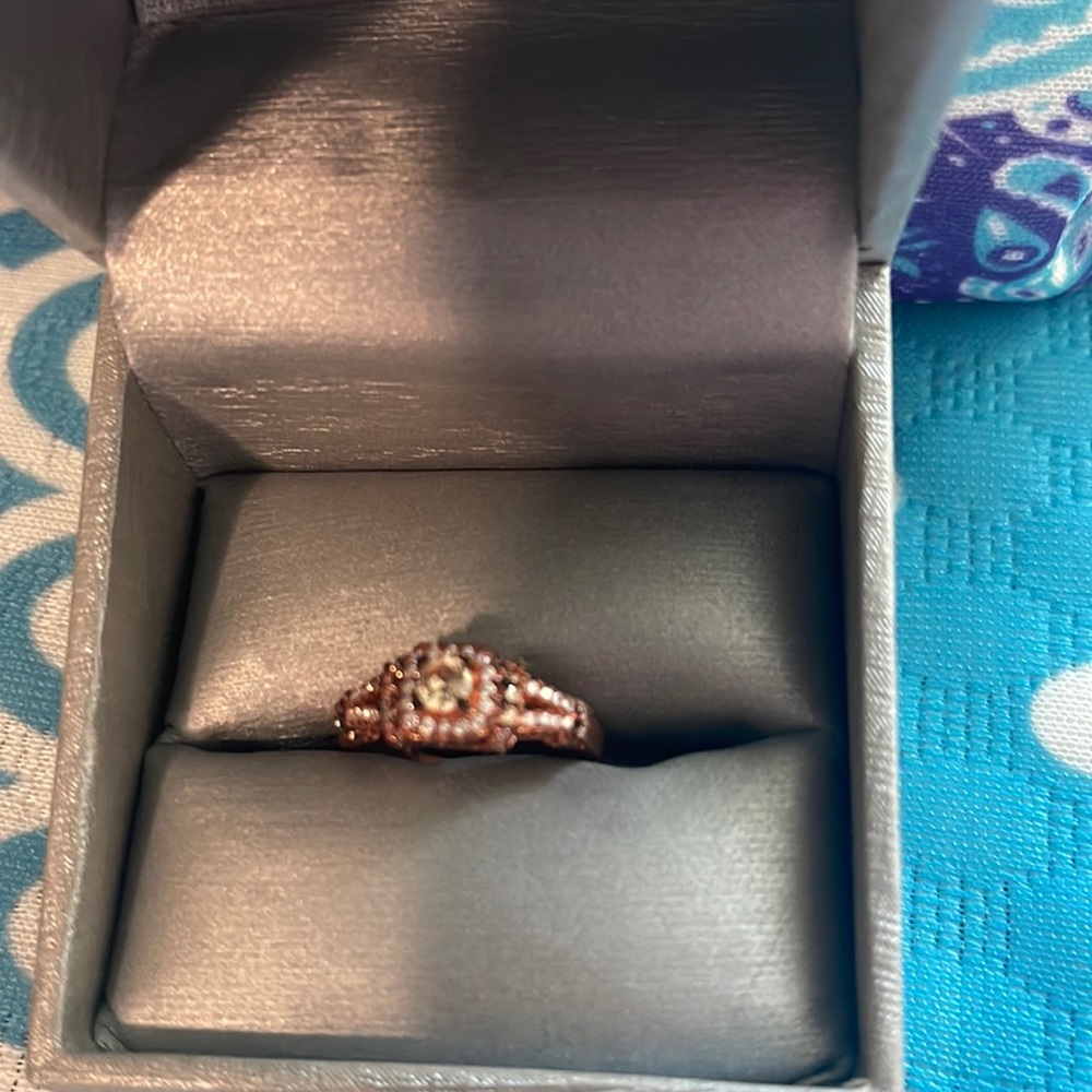 EUC rose gold ring with light pink rhinestones size 7